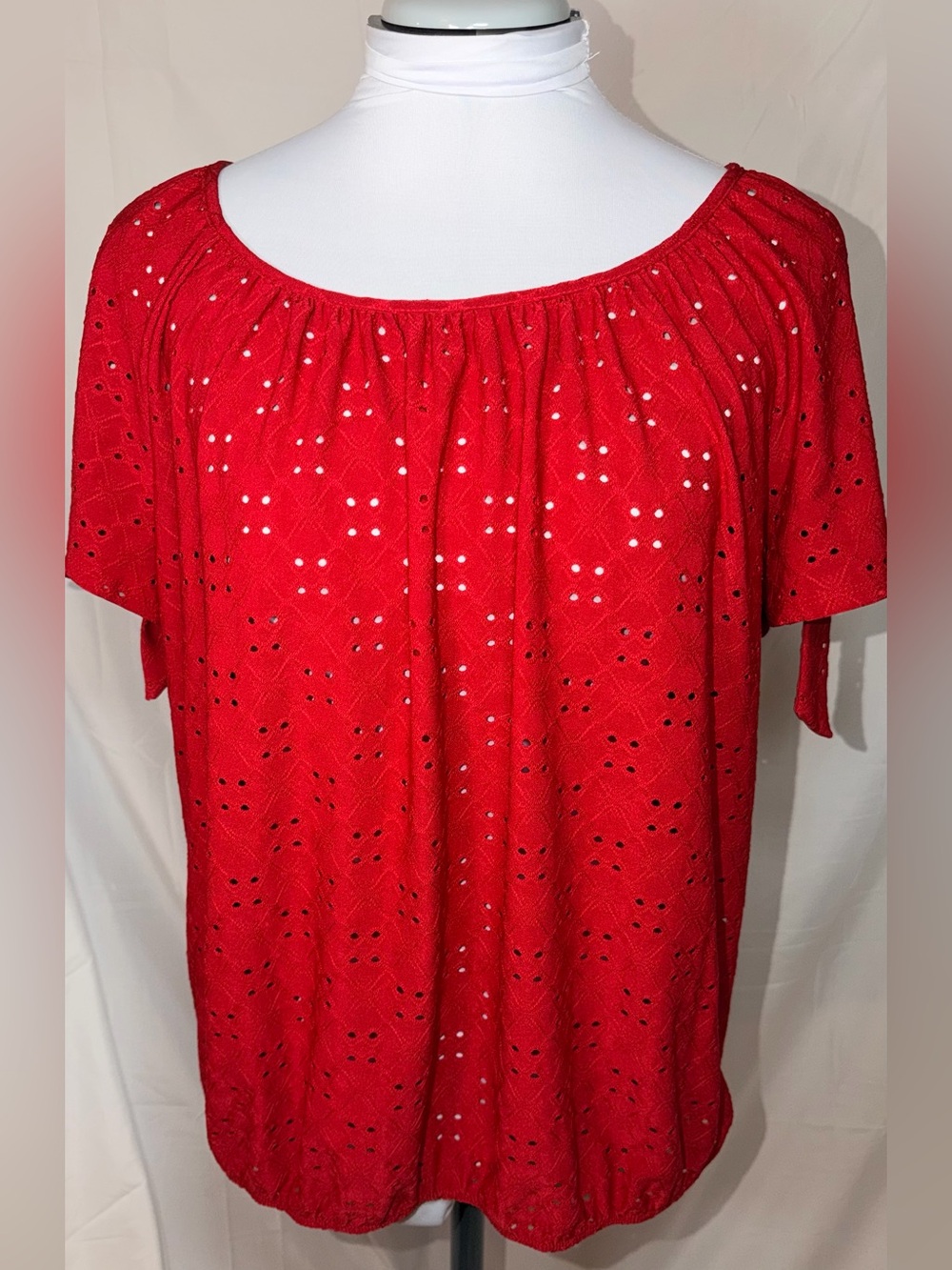 Red eyelet peasant-style blouse